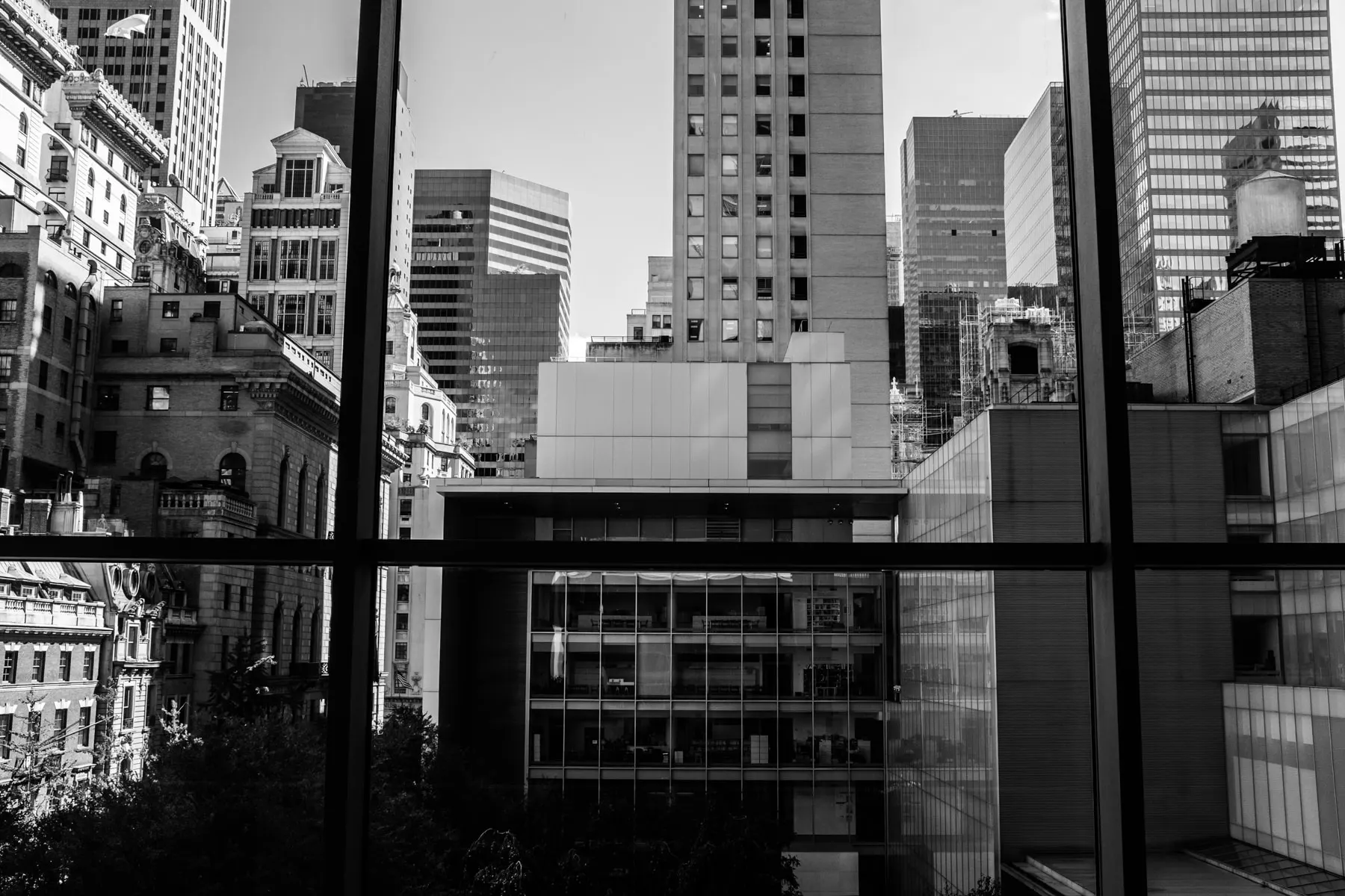 City block seen through a large window frame