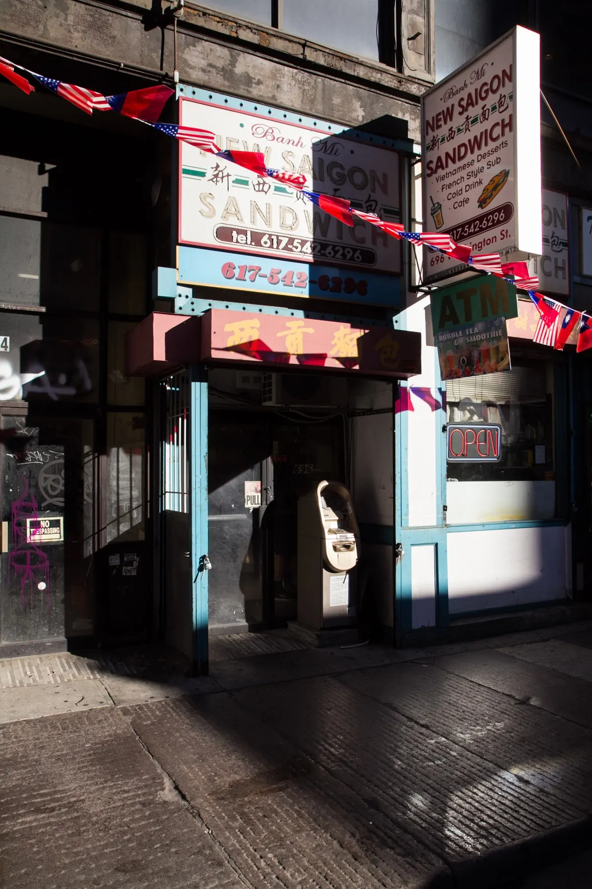 Corner sandwich shop in Chinatown hung with bunting