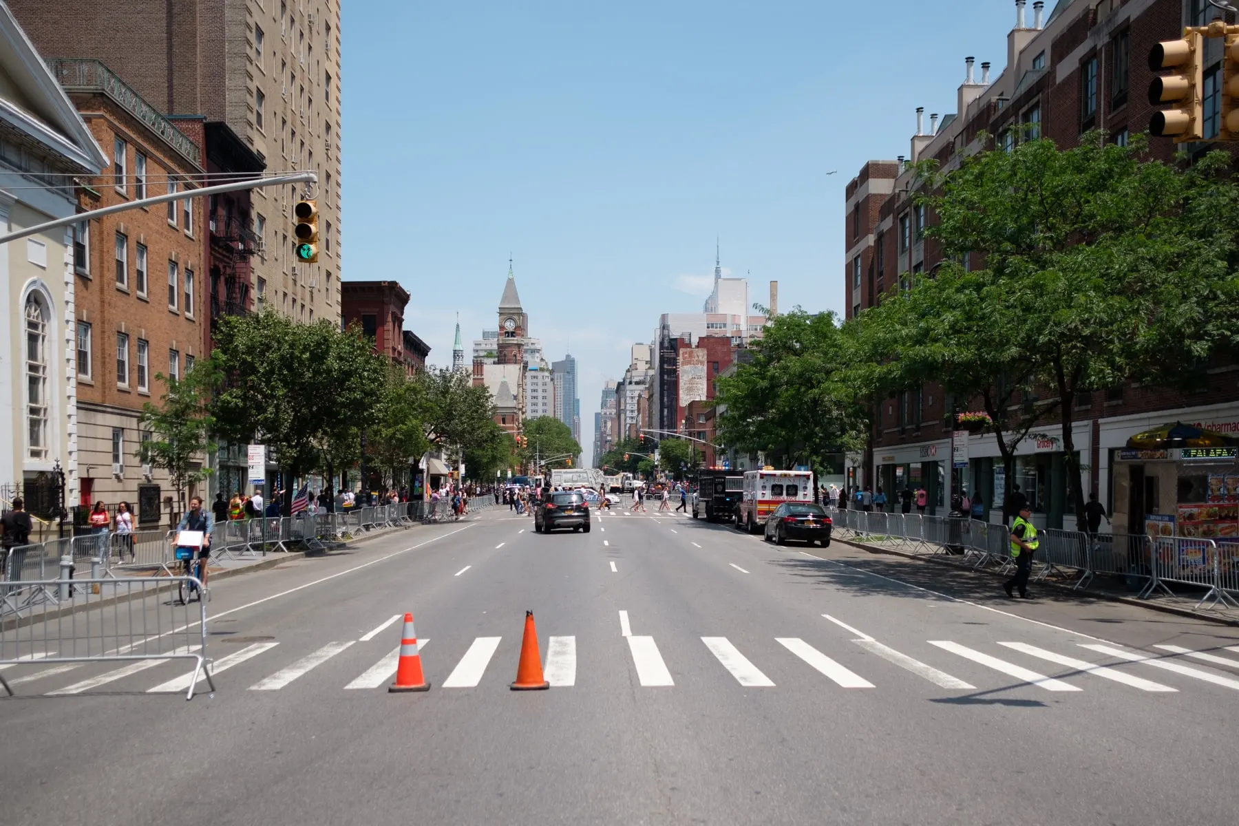 Cones on an empty avenue closed off with barriers